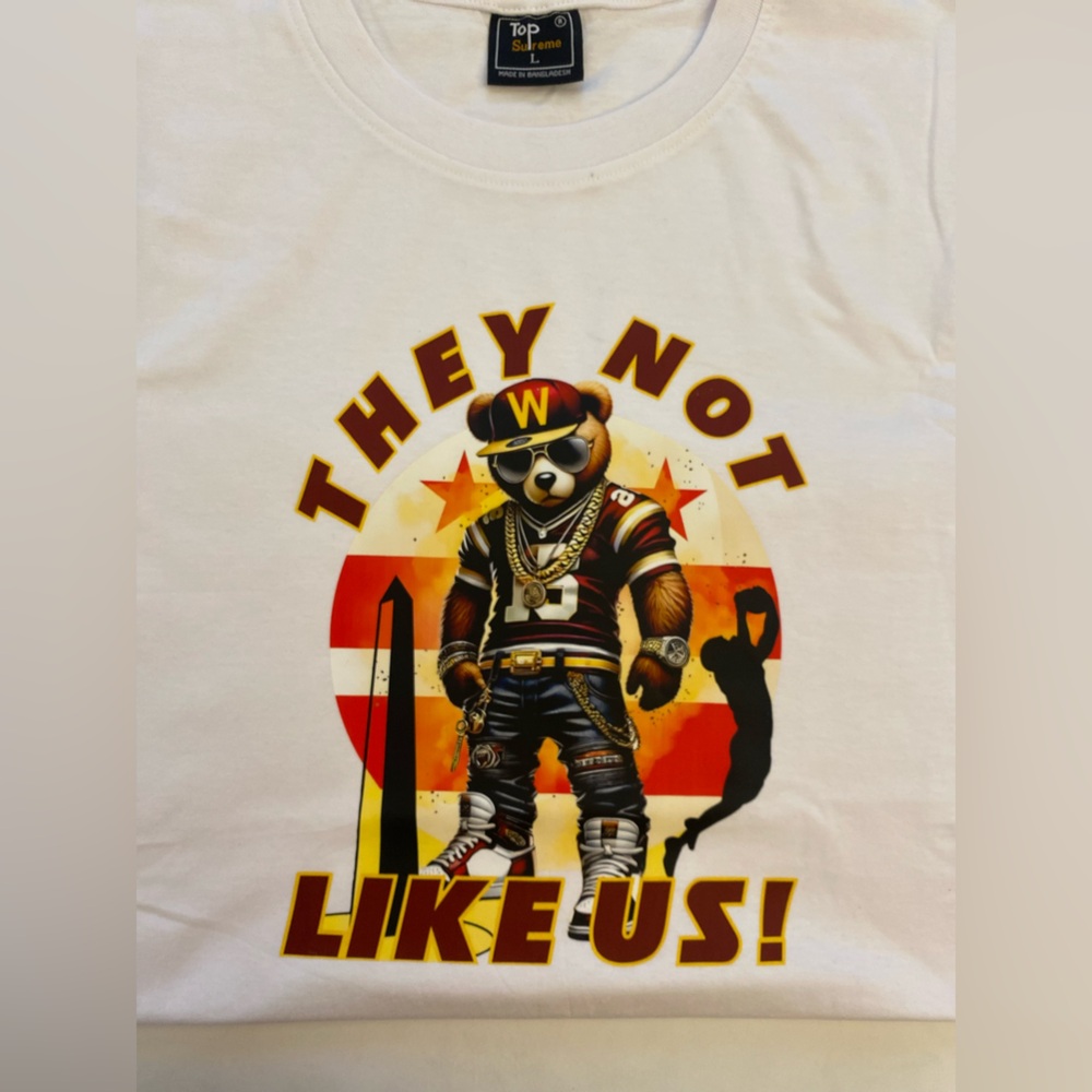 Commanders “Not Like Us” Unisex, short sleeves T-shirt, size Large PTP 21”
